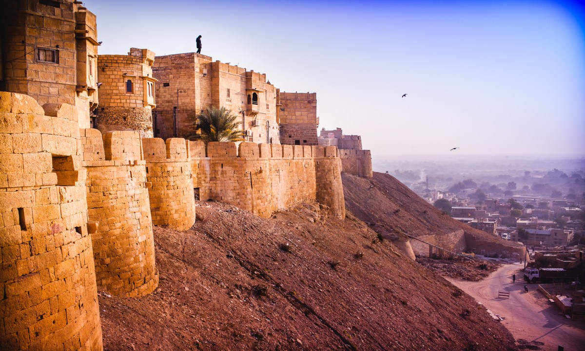 The city made of Gold. I was there looking at the man on the top of the fort, but maybe I am this man looking over the birds. Or maybe I am the birds. Jaisalmer, India, 2014.