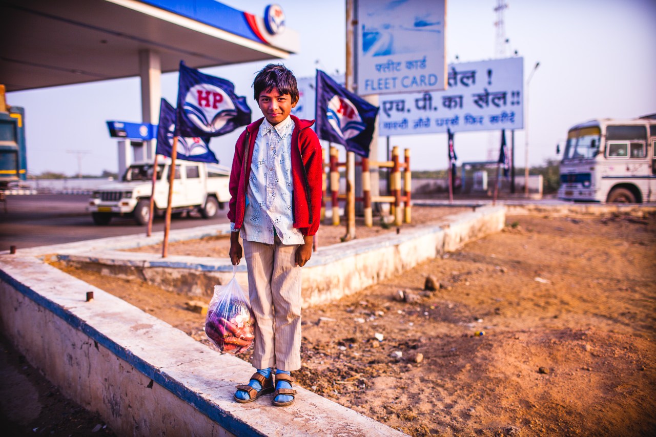 I've been on the road for a long time. People often ask me for how long I've been traveling, I use to say something like, a month, then 6 months, over a year... Now my answer is: "It's been 33 years". The little boy at the gas station. Rajasthan, India, 2014.
