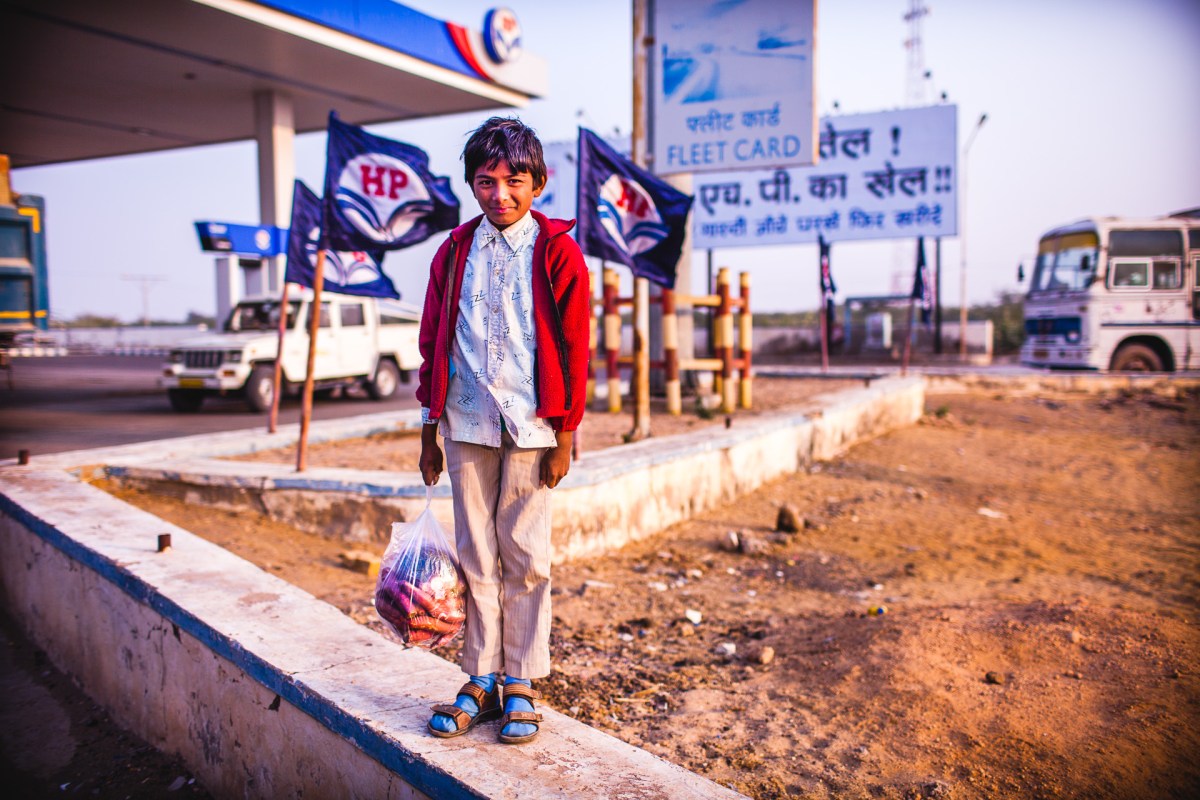 I've been on the road for a long time. People often ask me for how long I've been traveling, I use to say something like, a month, then 6 months, over a year... Now my answer is: "It's been 33 years". The little boy at the gas station. Rajasthan, India, 2014.