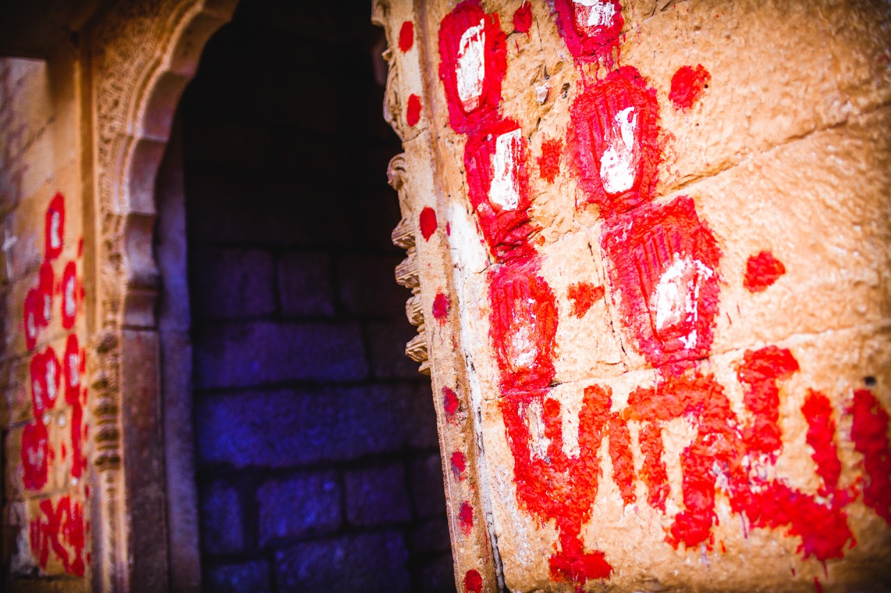 I'll never forget you. The entrance of the Fort Palace is still showing some red painted hand prints. It was the last trace a woman would leave behind her before entering the Harem. She would never go out or leave the place for the rest of her life. Jaisalmer, India, 2014.