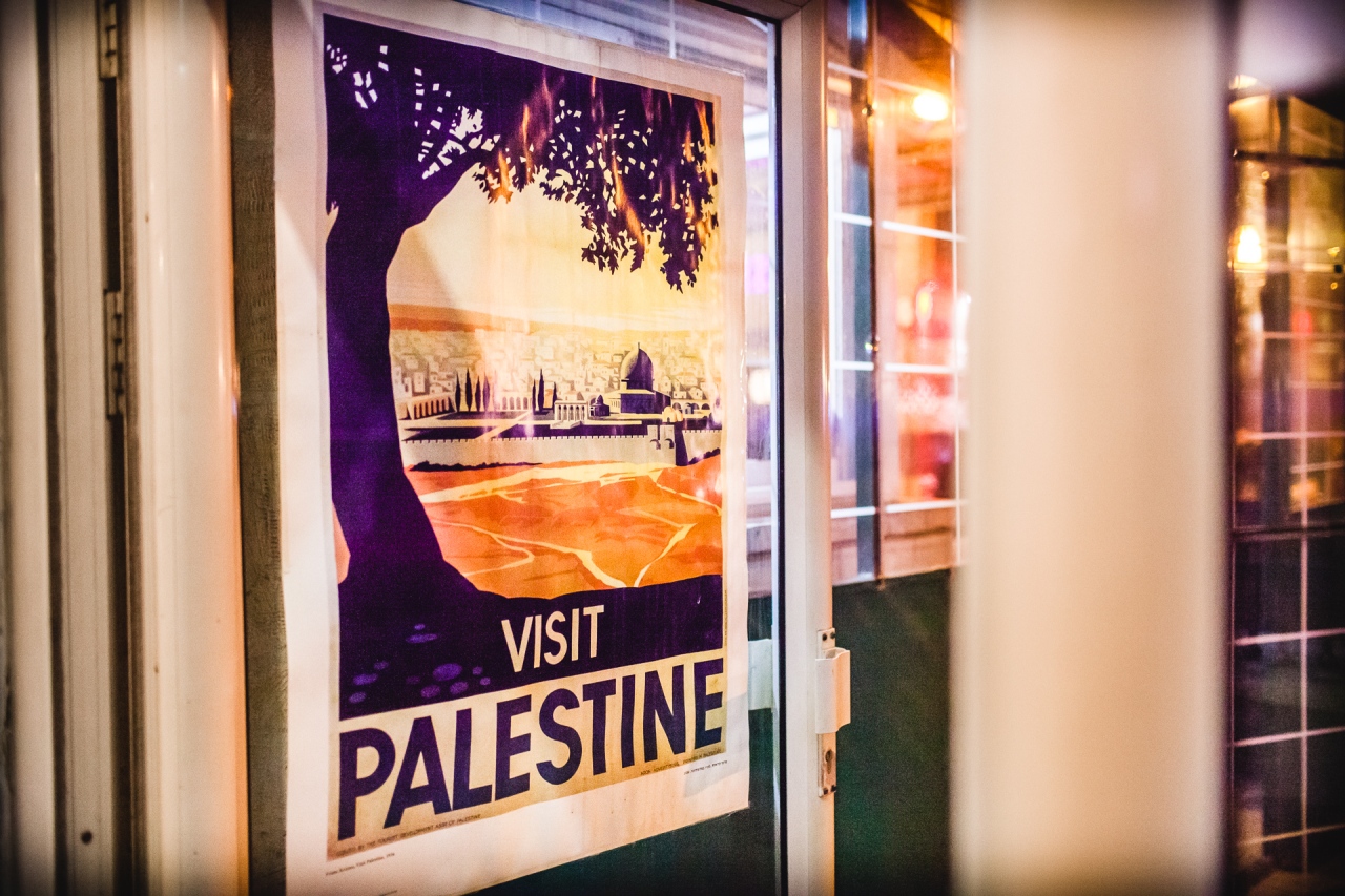 Visit Palestine, a sign in a café in Jerusalem. Jerusalem, Israel, 2014.
