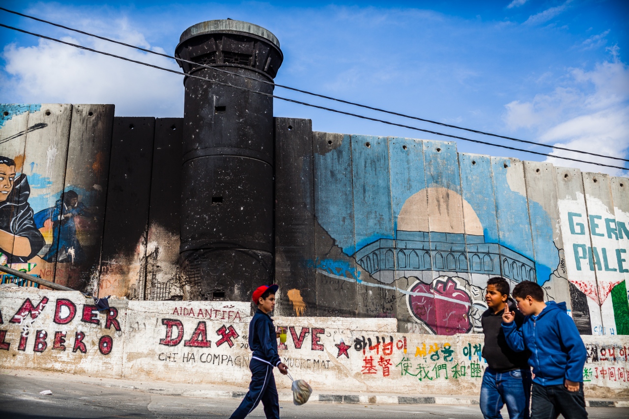Life scene along the Segregation Wall. Bethlehem, Palestine, 2014.