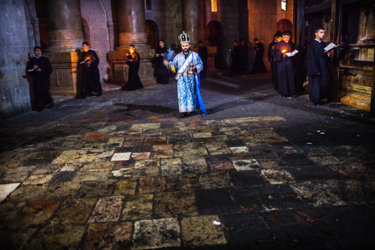 Incensing around the Aedicule which contains the Holy Sepulchre itself in the Church of the Holy Sepulchre. Jerusalem, Israel, 2014.